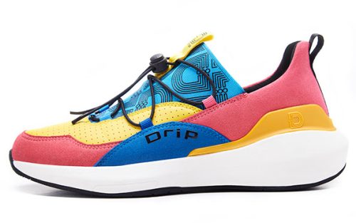 Golden Solemate sneaker in yellow, pink, blue, and black with "drip" text on the side, shown in profile.