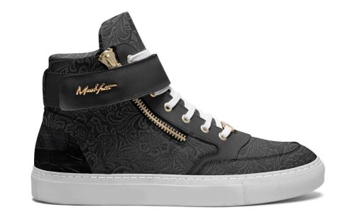 Amsterdam Twenty high-top sneaker in black with gold accents, paisley pattern, and white sole.