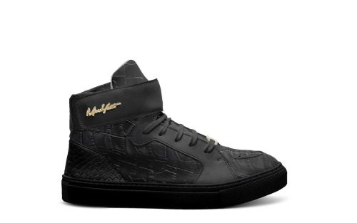 Amsterdam Kids H11 black high-top sneaker with textured pattern and gold signature detail on the side.