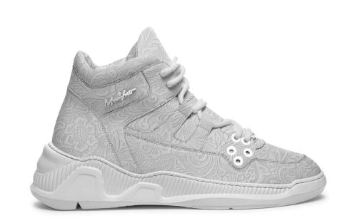 Coastal Bay 002 sneaker in light grey with embossed floral pattern, side view.