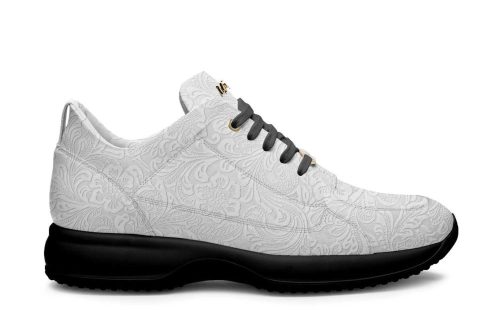 Everyday Corre 060 white sneaker with embossed pattern and black sole, shown from the side.