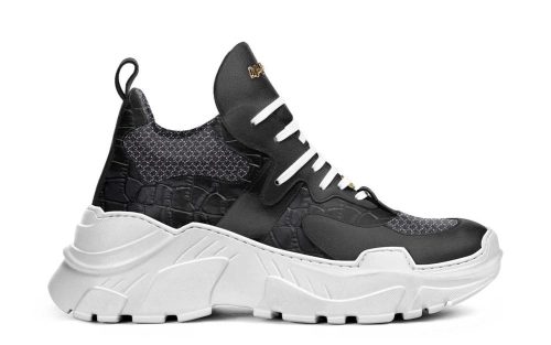 Combat H04 2.0 sneaker in black with textured details and chunky white sole, side view.