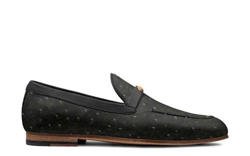 Firenze Black Ostrich Moccasin with wooden sole, side view showing textured leather and gold accent.