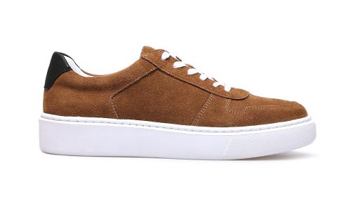 Brown suede low-top sneaker with white sole and laces, black heel accent, shown in side profile.