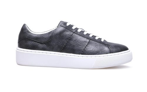 Grey leather low-top sneaker with white sole, side view, displayed on a plain background.