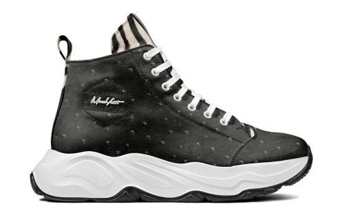 Maui Exclusive 006 sneaker in black with white laces and chunky white sole, side profile view.