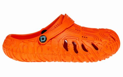 Bright orange Citrus Chill clog with textured surface and unique cutout design, side view.