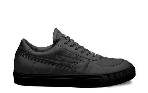 Skater One black low-top sneaker with lace-up design and signature side logo, product display.
