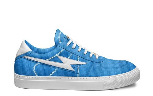 Skater 09 blue sneaker with white star design, white laces, and rubber sole on a plain background.