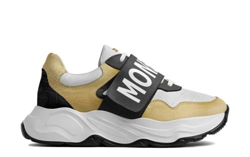 Valle Runner Golden Bar stylish sneaker with gold, white, and black accents on product page.